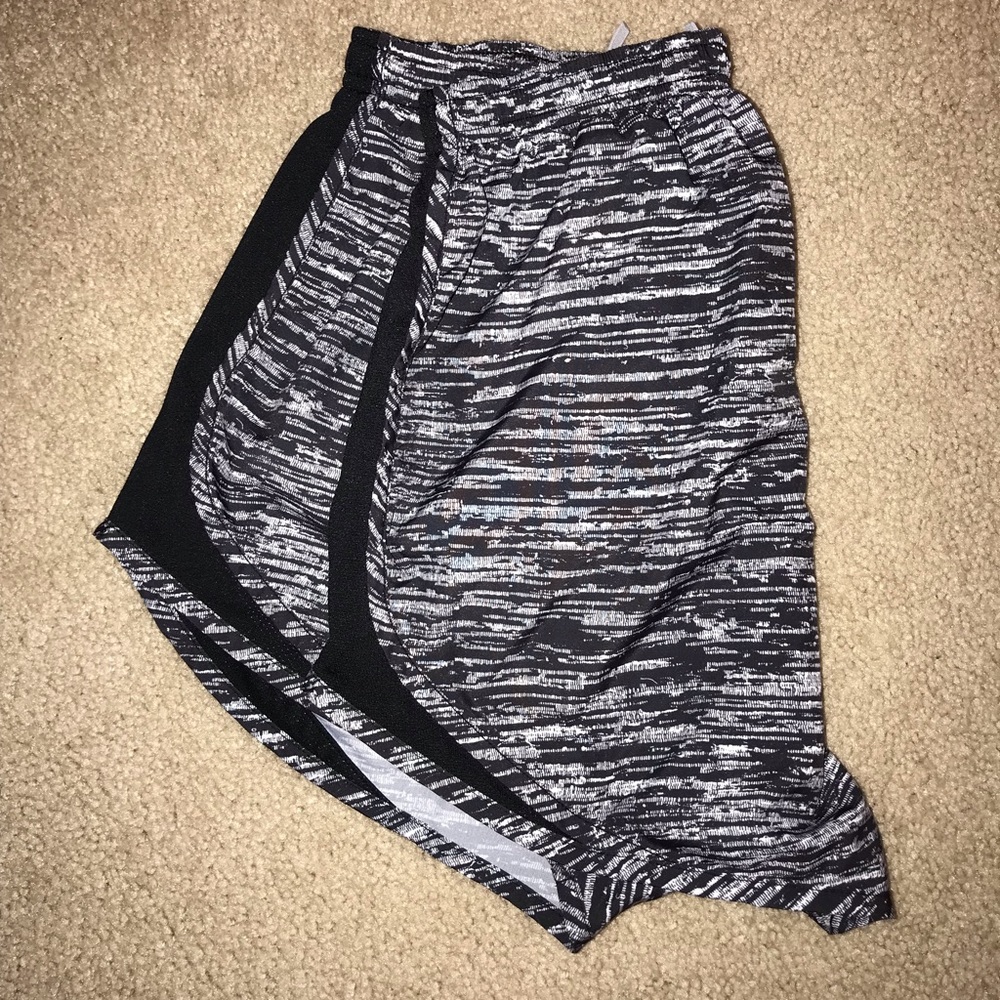 Multiple pairs of Nike running shorts
